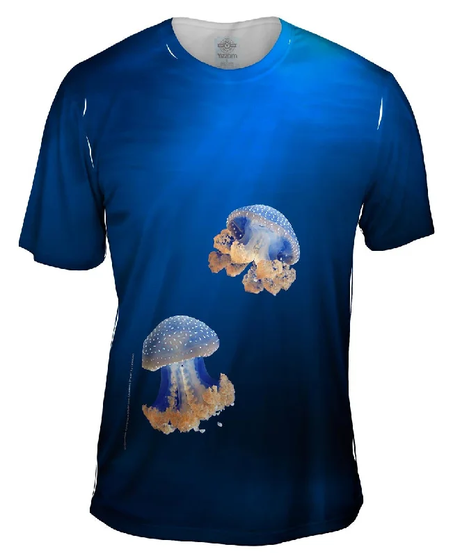 Blue Jellyfish Rise Underwater